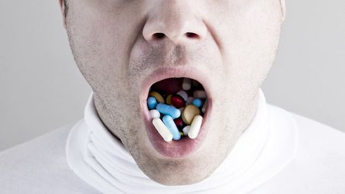 990382-mouthful-of-pills-and-generic-and-drugs